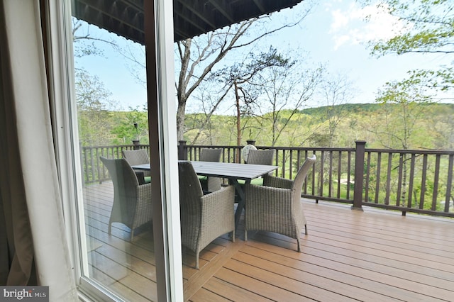 deck featuring outdoor dining space