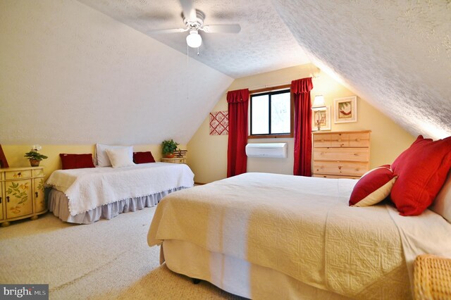 bedroom with vaulted ceiling, a ceiling fan, carpet flooring, and a textured ceiling