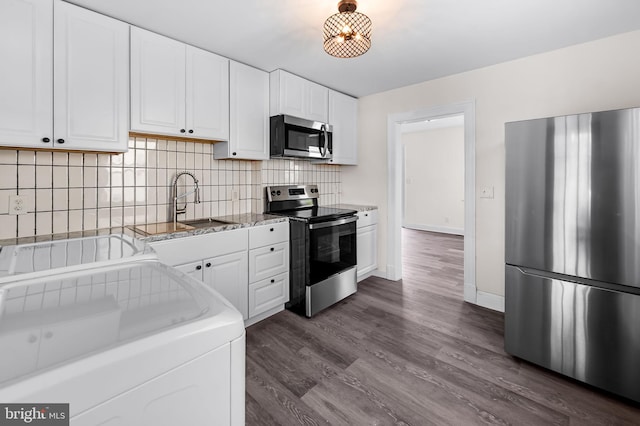 18 Crafton Rd, Baltimore, MD 21221 - kitchen with a sink, appliances with stainless steel finishes, tasteful backsplash, and white cabinets