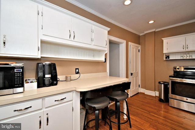 5 Ambler Rd, Ambler, PA 19002 - kitchen with built in desk, open shelves, white cabinetry, stainless steel range with electric stovetop, and dark wood-style flooring