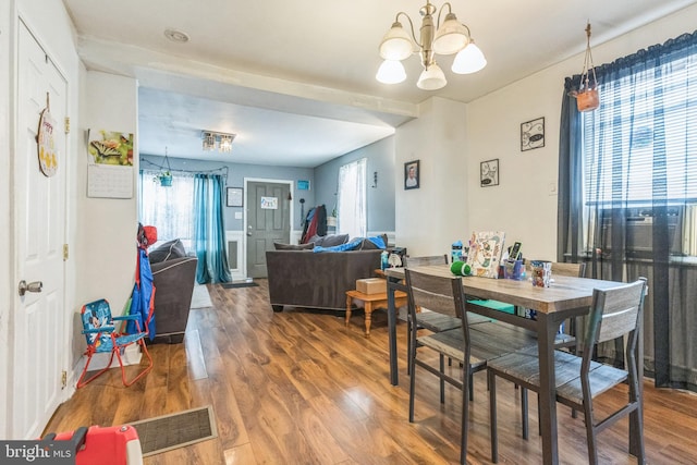 3526 Welsh Rd, Philadelphia, PA 19136 - dining room featuring a wealth of natural light, wood finished floors, and a chandelier