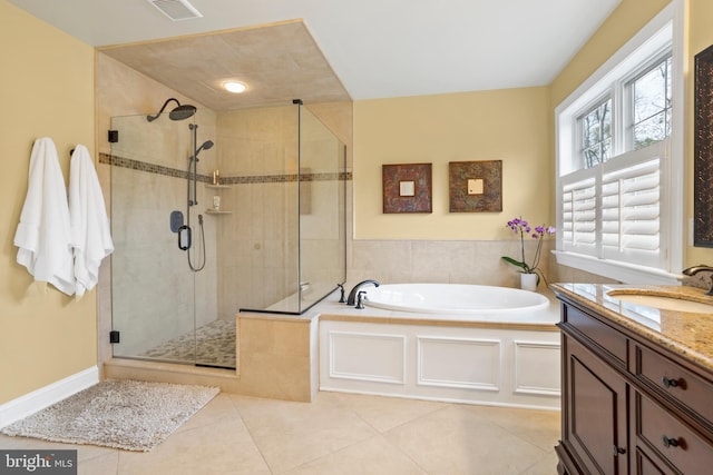 bathroom featuring visible vents, tile patterned floors, a bath, and a shower stall