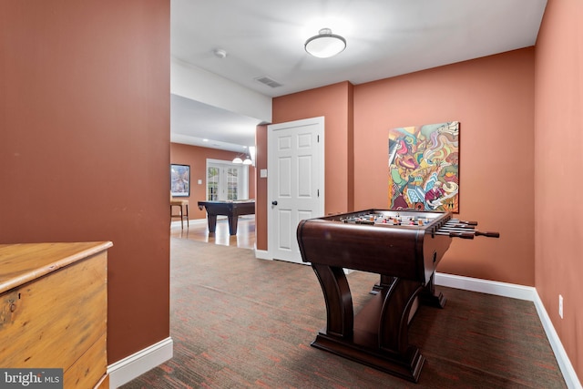 game room featuring baseboards, carpet, and visible vents