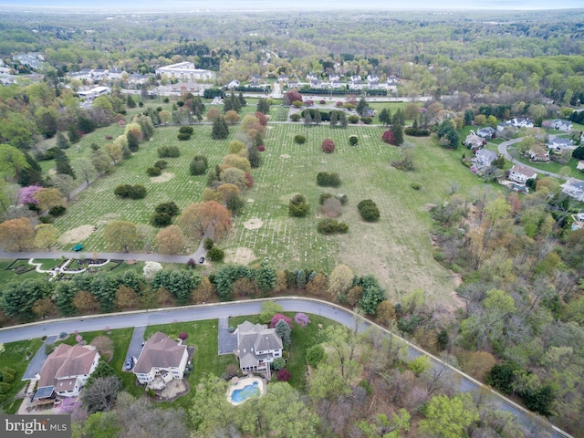 birds eye view of property with a rural view