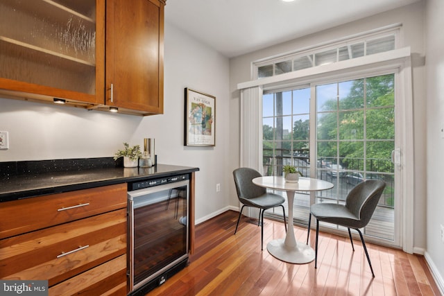 1617 Potomac Greens Dr Unit A, Alexandria, VA 22314 - indoor dry bar featuring wine cooler, hardwood / wood-style floors, and baseboards