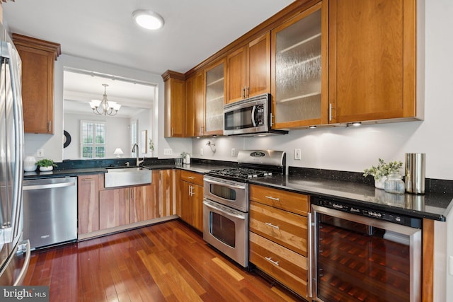 1617 Potomac Greens Dr Unit A, Alexandria, VA 22314 - kitchen featuring wine cooler, appliances with stainless steel finishes, a sink, and dark countertops