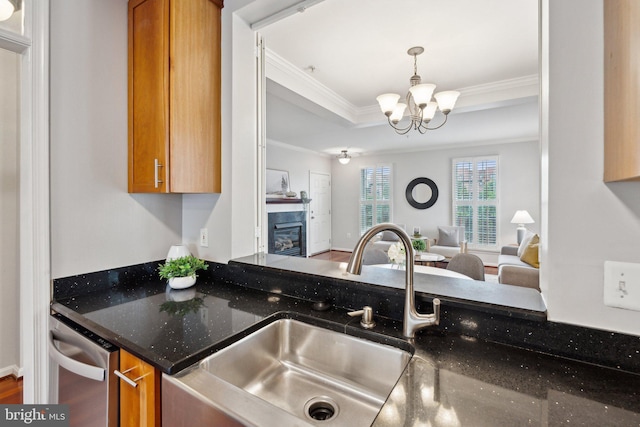 1617 Potomac Greens Dr Unit A, Alexandria, VA 22314 - kitchen with brown cabinets, ornamental molding, a chandelier, open floor plan, and a sink