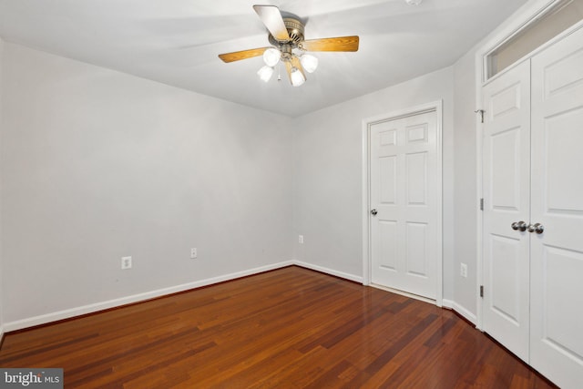 1617 Potomac Greens Dr Unit A, Alexandria, VA 22314 - unfurnished bedroom featuring wood finished floors, baseboards, ceiling fan, and a closet