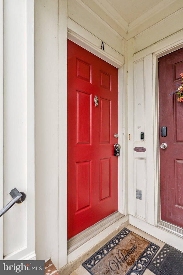1617 Potomac Greens Dr Unit A, Alexandria, VA 22314 - view of exterior entry with board and batten siding and a porch