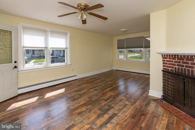 unfurnished living room featuring a baseboard radiator, wood finished floors, a fireplace, and ceiling fan