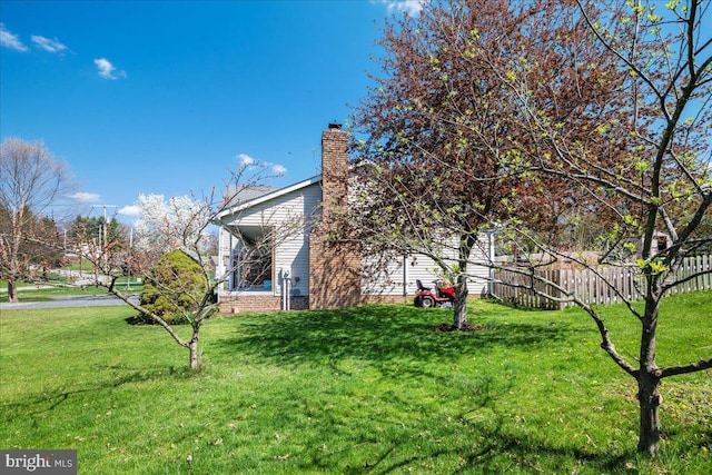 view of yard with fence