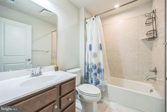 full bath with tile patterned flooring, vanity, visible vents, toilet, and shower / tub combo