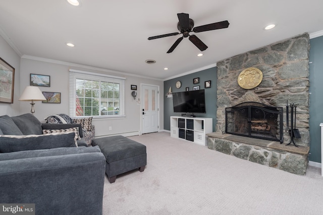 living area featuring carpet flooring, crown molding, and a ceiling fan
