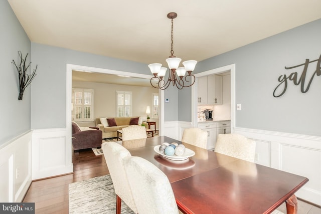 5580 Ann Peake Dr, Fairfax, VA 22032 - dining space with a decorative wall and a wainscoted wall