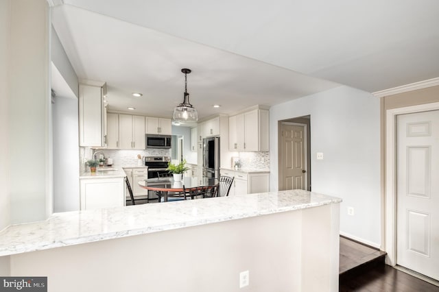5580 Ann Peake Dr, Fairfax, VA 22032 - kitchen with tasteful backsplash, light stone countertops, appliances with stainless steel finishes, and dark wood-style flooring