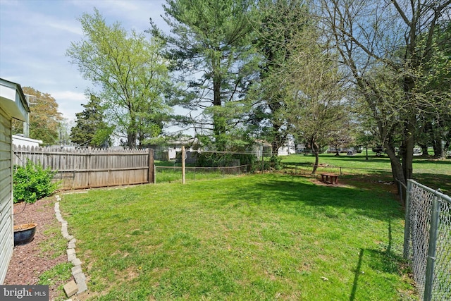 view of yard with fence