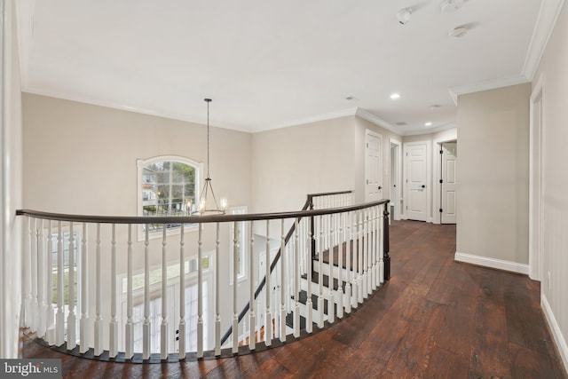 corridor with baseboards, recessed lighting, a notable chandelier, an upstairs landing, and wood-type flooring