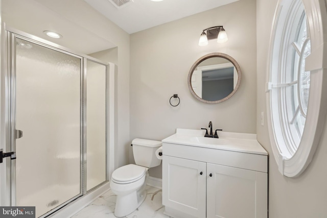 bathroom with a shower stall, marble finish floor, toilet, vanity, and baseboards