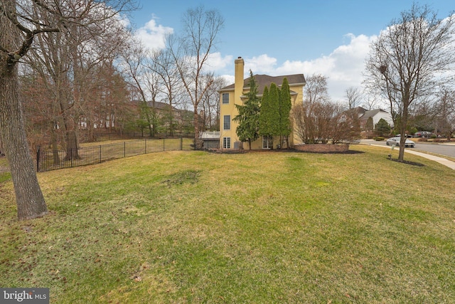 view of yard featuring fence