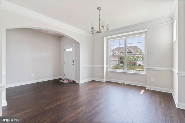 4507 Shakespeare Cir, White Plains, MD 20695 - unfurnished dining area featuring arched walkways, a chandelier, baseboards, dark wood-type flooring, and ornamental molding