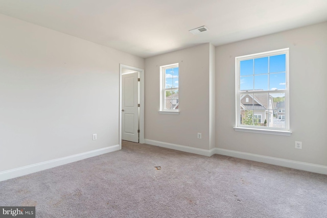 4507 Shakespeare Cir, White Plains, MD 20695 - carpeted spare room with baseboards and visible vents