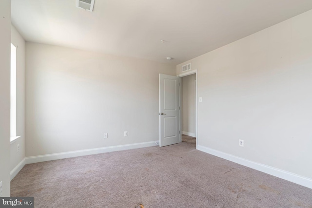 4507 Shakespeare Cir, White Plains, MD 20695 - carpeted empty room with visible vents, baseboards, and a wealth of natural light
