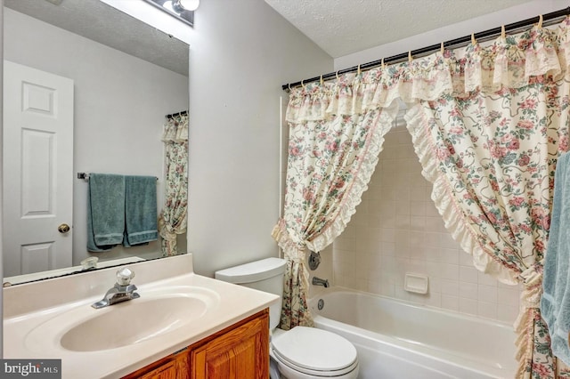 9208 Homestretch Ct, Laurel, MD 20723 - bathroom featuring vanity, a textured ceiling, bathing tub / shower combination, and toilet