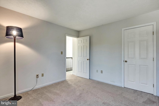 9208 Homestretch Ct, Laurel, MD 20723 - unfurnished bedroom with baseboards and carpet flooring