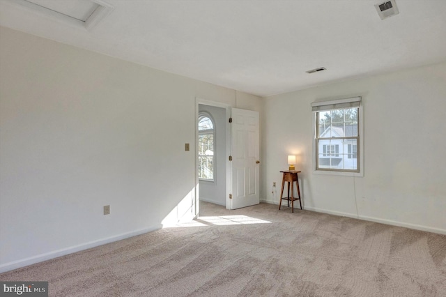 9208 Homestretch Ct, Laurel, MD 20723 - carpeted foyer entrance featuring a healthy amount of sunlight, baseboards, and visible vents