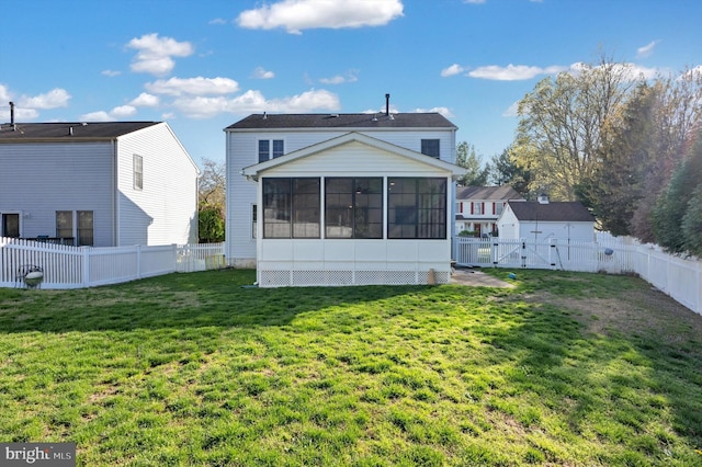 9208 Homestretch Ct, Laurel, MD 20723 - back of house featuring a yard, a fenced backyard, a gate, and a sunroom