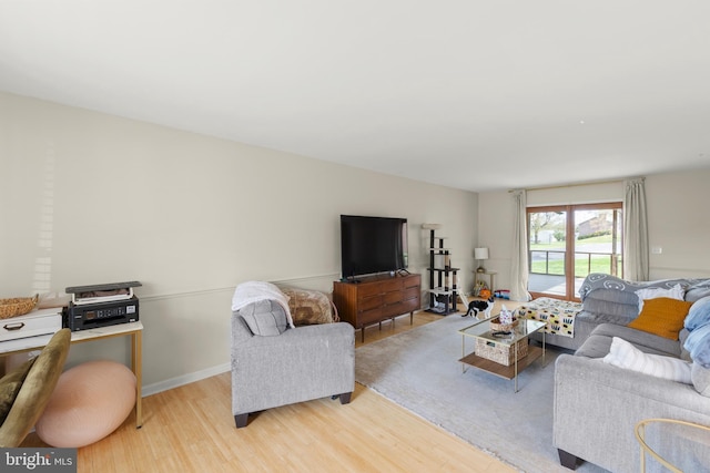 living area with wood finished floors