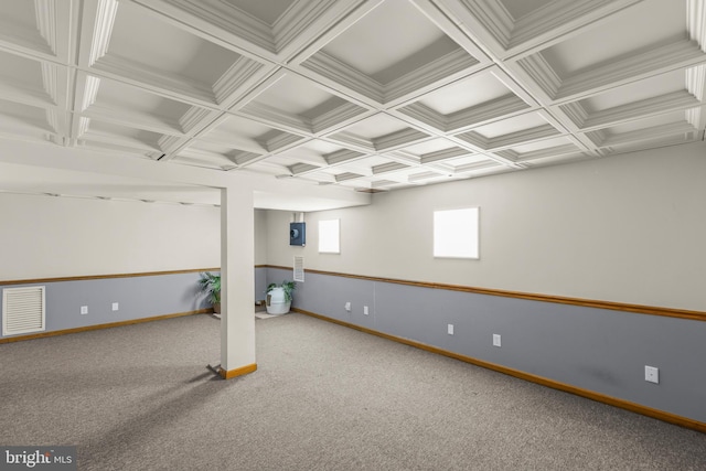 basement featuring visible vents, carpet, and baseboards