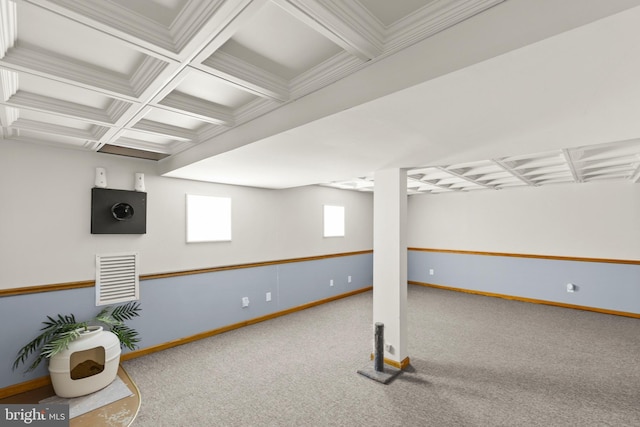 basement featuring visible vents and baseboards
