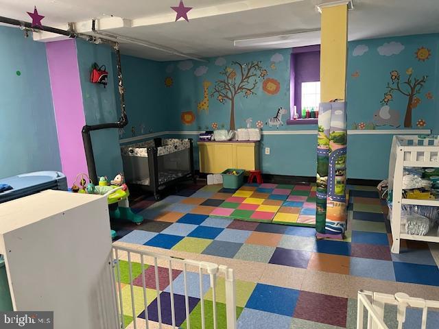 4900 N 11th St, Philadelphia, PA 19141 - playroom with tile patterned floors