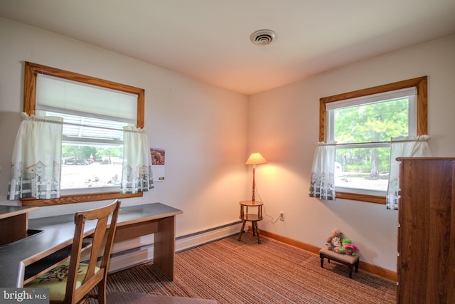 office featuring baseboards, visible vents, and carpet