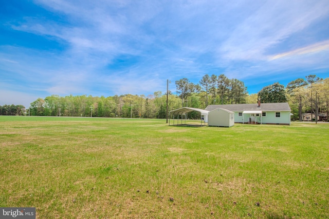 view of yard with a carport