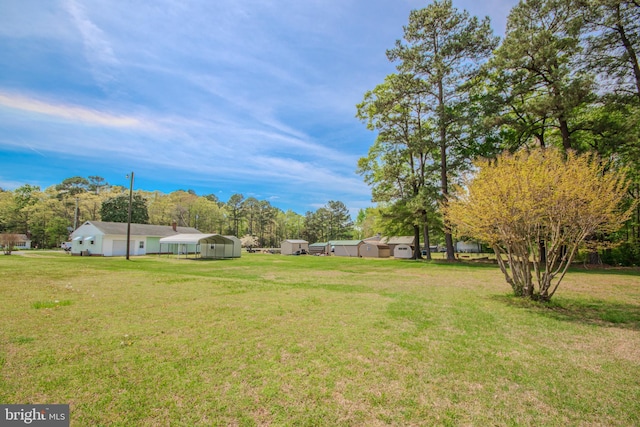 view of yard with a carport