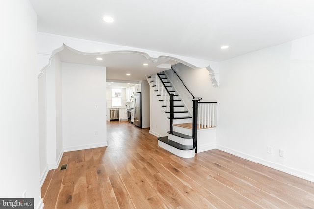 interior space featuring recessed lighting, stairs, visible vents, and light wood-type flooring