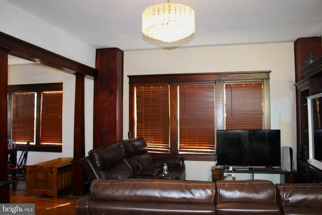 408 Prince George St, Cumberland, MD 21502 - living area with a chandelier and wood finished floors