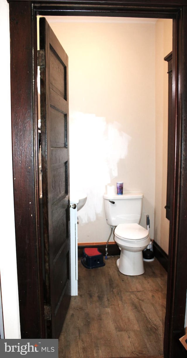 408 Prince George St, Cumberland, MD 21502 - bathroom featuring wood finished floors, baseboards, and toilet