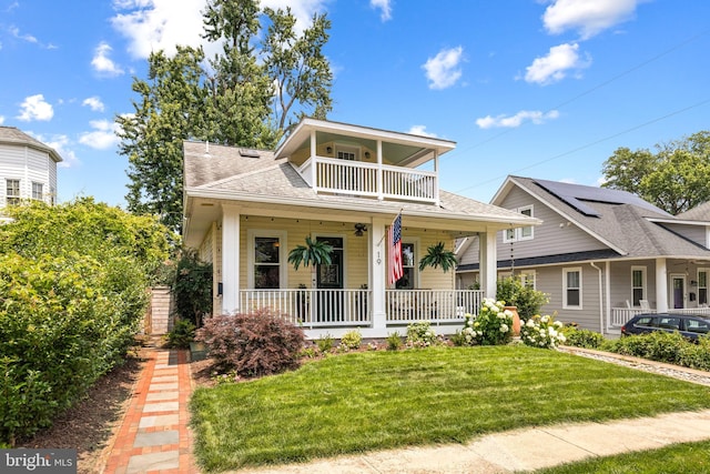 19 W Wyatt Ave, Alexandria, VA 22301 - view of front facade with a porch, a balcony, a front yard, and roof with shingles