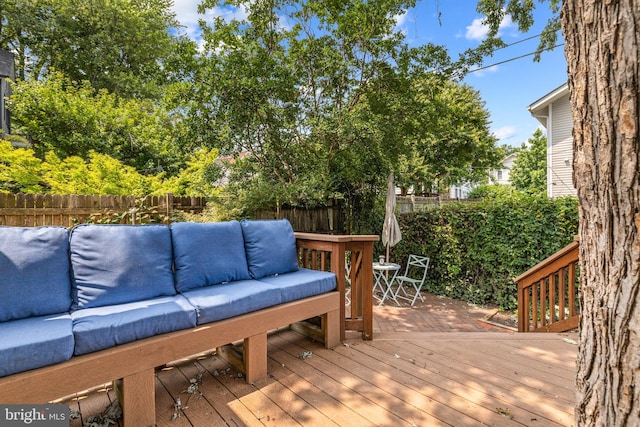 19 W Wyatt Ave, Alexandria, VA 22301 - wooden deck featuring an outdoor hangout area, a fenced backyard, and outdoor dining area