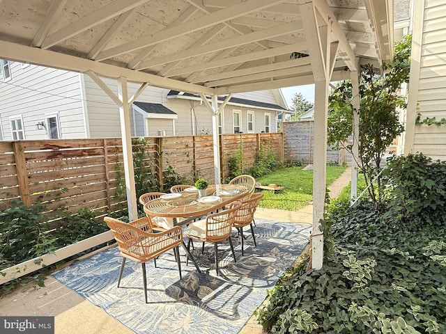 19 W Wyatt Ave, Alexandria, VA 22301 - fenced backyard with outdoor dining space and a patio