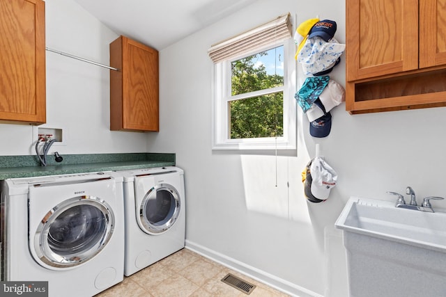 19 W Wyatt Ave, Alexandria, VA 22301 - laundry room featuring cabinet space and washing machine and clothes dryer