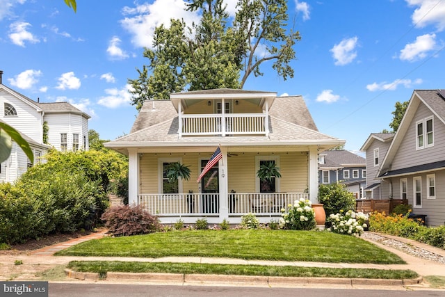 19 W Wyatt Ave, Alexandria, VA 22301 - bungalow-style house featuring a porch, a balcony, a front yard, and a shingled roof