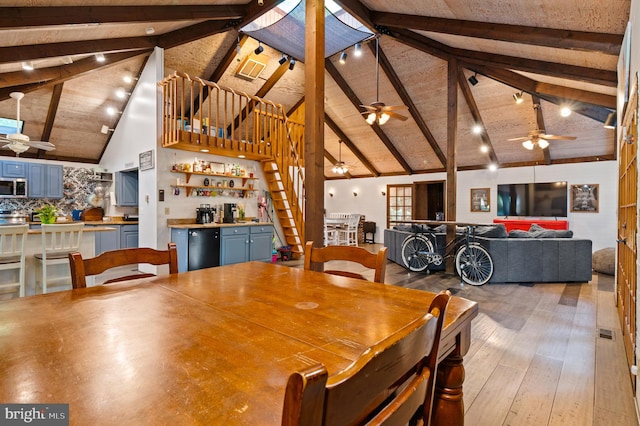 2436 Warm Springs Rd, Shenandoah Junction, WV 25442 - dining room featuring ceiling fan, beam ceiling, stairs, high vaulted ceiling, and hardwood / wood-style floors