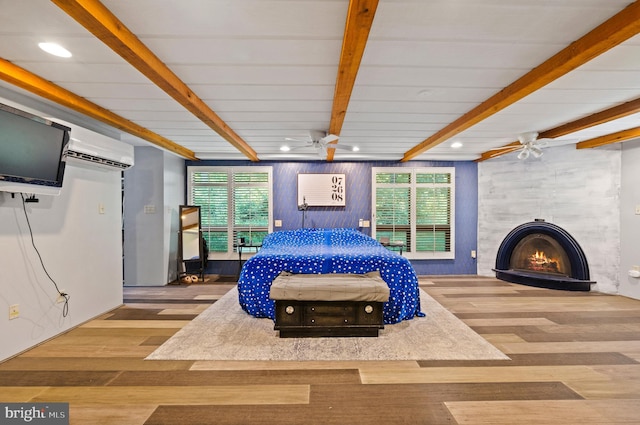 2436 Warm Springs Rd, Shenandoah Junction, WV 25442 - bedroom featuring beam ceiling, a large fireplace, recessed lighting, wood finished floors, and an AC wall unit