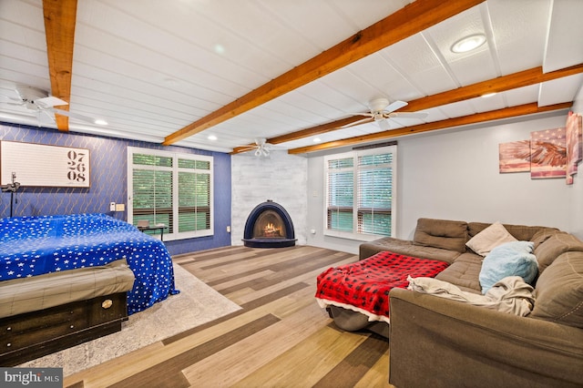 2436 Warm Springs Rd, Shenandoah Junction, WV 25442 - bedroom with wood finished floors, beam ceiling, multiple windows, a fireplace, and recessed lighting