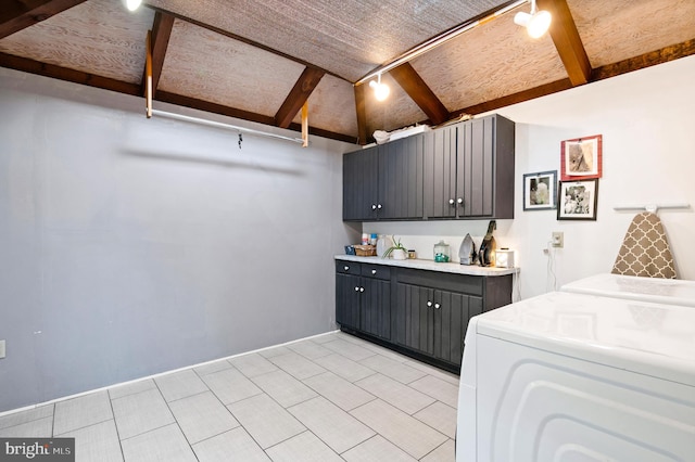 2436 Warm Springs Rd, Shenandoah Junction, WV 25442 - laundry area featuring cabinet space, washing machine and clothes dryer, and light tile patterned floors