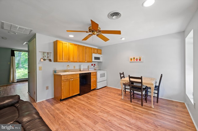 2436 Warm Springs Rd, Shenandoah Junction, WV 25442 - kitchen featuring white appliances, light wood-style flooring, light countertops, ceiling fan, and recessed lighting
